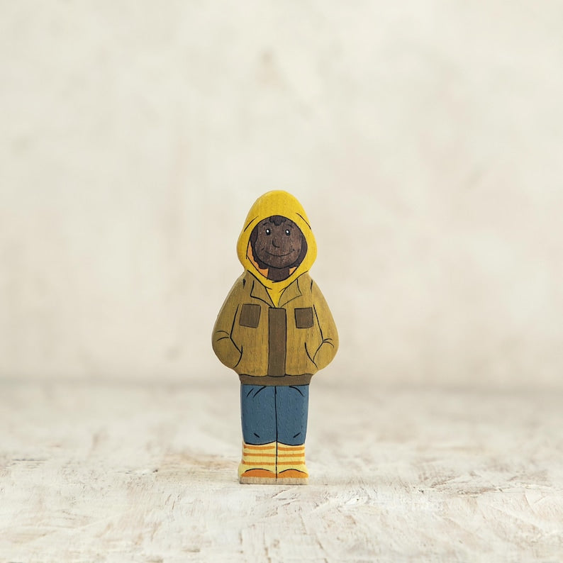 Wooden Boy Figurine in Yellow Jacket – Hand-Painted Winter-Themed Toy for Kids